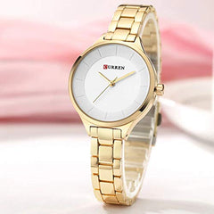 CURREN Elegant Design Women's Watch, Shiny Hands, Minimalist Dial with Adjustable Stainless Steel Band with Butterfly Clasp for Safety, Gold with White, M, Casual