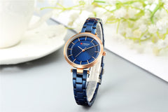 CURREN Ladies analog watch rose gold stainless steel case blue dial blue stainless steel bracelet