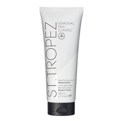St.Tropez Gradual Tan Firming Lotion, Medium/Dark Shade, Sun Kissed Glow Self Tan Moisturiser, 5 Skincare Benefits, Vegan, Natural & Cruelty Free, 200 ml