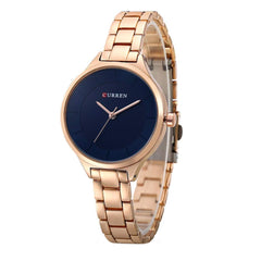 CURREN Elegant Design Women's Watch, Shiny Hands, Minimalist Dial with Stainless Steel Extendable Adjustable Strap with Butterfly Clasp for Safety, Blue with Gold, M, Casual