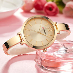 CURREN Women's Analog Watch with Rigid Bracelet Safety Clasp Classic Design Elegant Formal Lightweight, Golden, Pequeño, formal - Gold