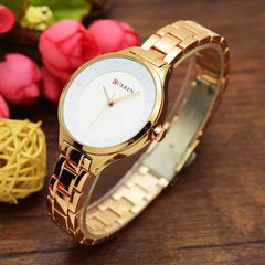 CURREN Elegant Design Women's Watch, Shiny Hands, Minimalist Dial with Adjustable Stainless Steel Band with Butterfly Clasp for Safety, Gold with White, M, Casual