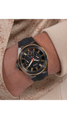 GUESS BR GUN CS W/BR GLD TR W/BR GUN TOP/SUN BLK MF DL/BLK TEXTURED SILICONE STRP