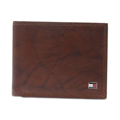 Tommy Hilfiger Carry a full complement of cards inside this extra-capacity men's wallet from Tommy Hilfiger, in full-grain leather with RFID protection that helps block electronic theft. Men's Traveler RFID Extra-Capacity Bifold Leather Wallet