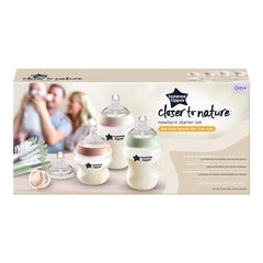 Tommee Tippee Closer to Nature Newborn Baby Bottle Starter Set | Breast-Like Nipple, Anti-Colic Wide Neck Bottles with Slow and Medium Flow Nipples- 9 Piece Set