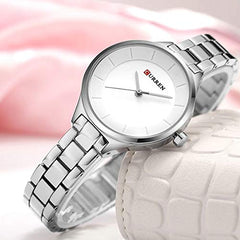 CURREN Elegant Design Women's Watch, Shiny Hands, Minimalist Dial with Adjustable Stainless Steel Band with Butterfly Clasp for Safety, silver with white, M, Casual