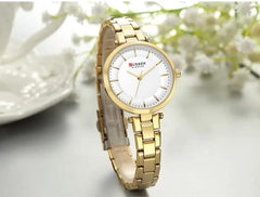 CURREN Ladies Analog Watch Gold Stainless Steel Case White Dial Goldtone Stainless Steel Bracelet