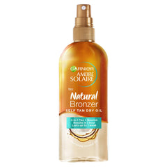 Garnier Ambre Solaire Natural Bronzer Self Tan Dry Oil 150ml,2-in-1 Oil Enriched With Coconut Oil,Nourishes Skin & Leaves A Luminous Fake Tan,Natural Streak-Free Result,Lasts Upto 1 week,Vegan Formula