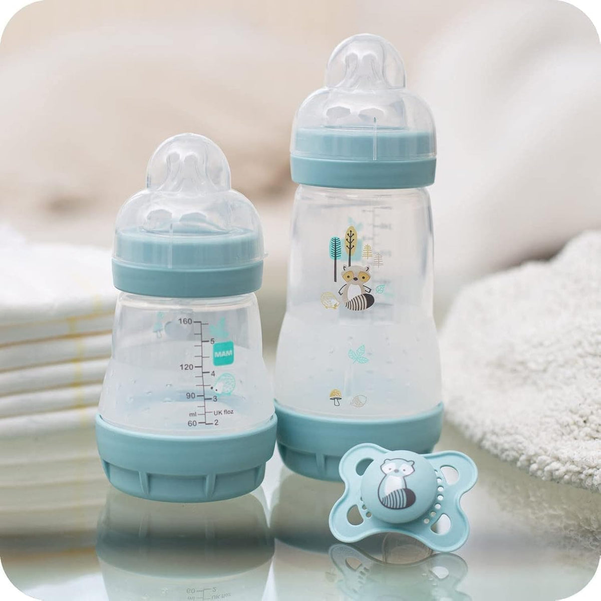 MAM Easy Start Colours of Nature Starter Self Sterilising Anti Colic Starter Set, Non-Shiny Matt Finish Newborn Bottle Set and Soother, Newborn Essentials, Green (Designs May Vary)