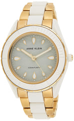 Anne Klein Women's Solar Powered Watch with Analog Display and Stainless Steel Bracelet AK3910WTGB