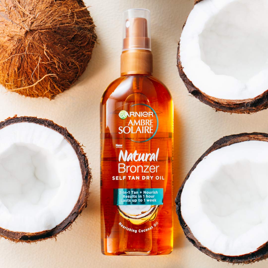 Garnier Ambre Solaire Natural Bronzer Self Tan Dry Oil 150ml,2-in-1 Oil Enriched With Coconut Oil,Nourishes Skin & Leaves A Luminous Fake Tan,Natural Streak-Free Result,Lasts Upto 1 week,Vegan Formula