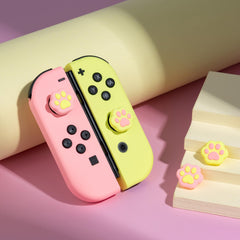 GeekShare Cat Paw Shape Thumb Grip Caps,Soft Silicone Joystick Cover Compatible with Switch/OLED/Switch Lite,4PCS (PinkYellow)