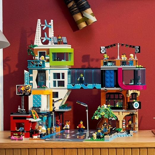 LEGO 60380 City City Centre Set, Model Building Kit with Reconfigurable Modular Rooms including Toy Shops, Barber, Vlogger Studio, Hotel and Rooftop Disco with 14 Minifigures